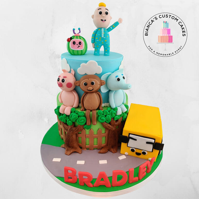 Coco-Melon-Figurines-and-Bus-Cake