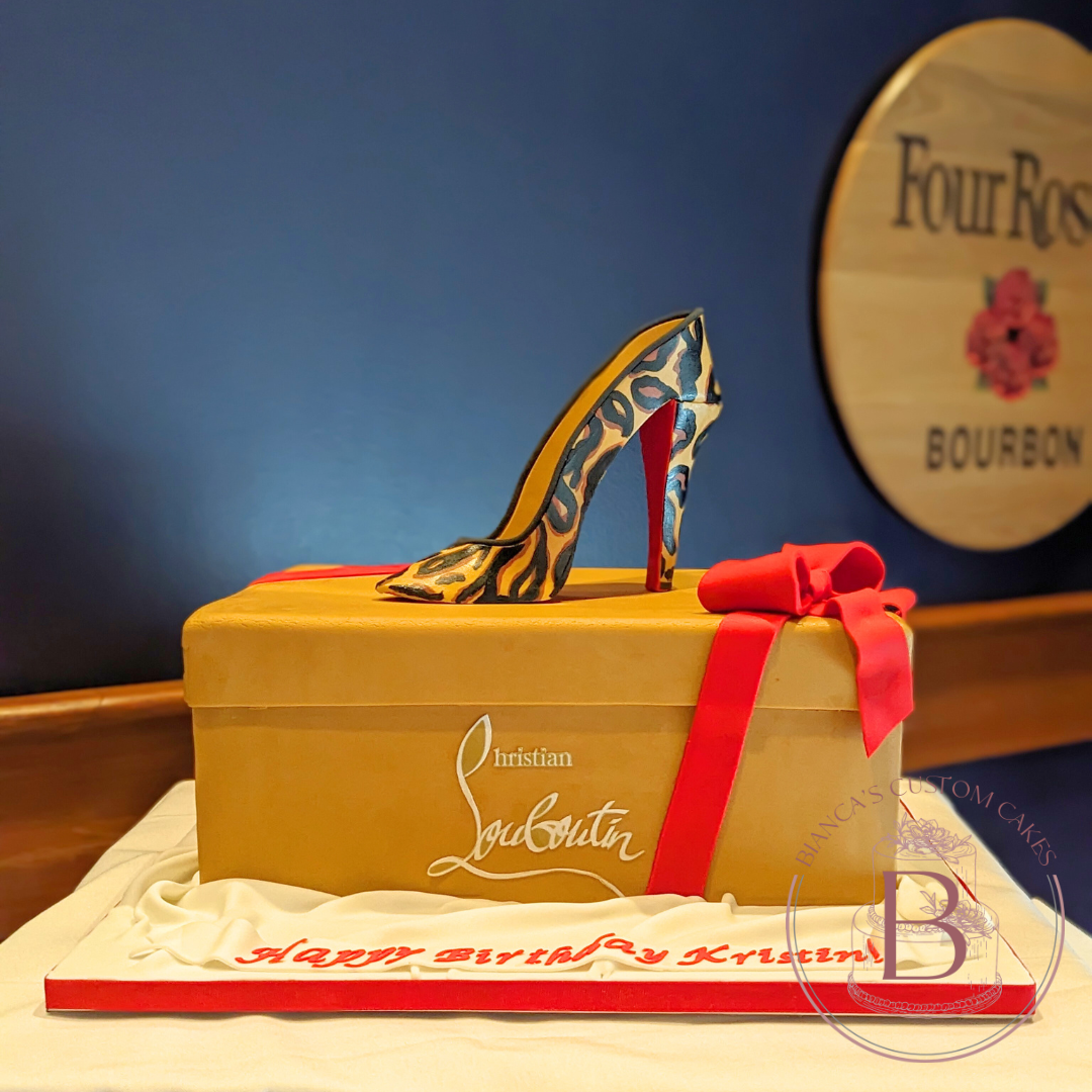 designer label shoe box with red bottom high heel fondant shoe
